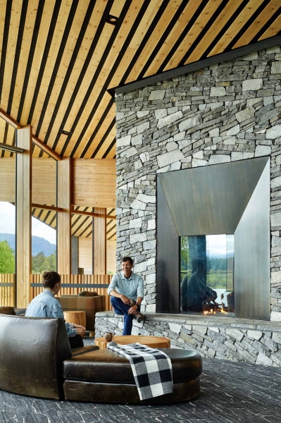 A Warm Wood Interior Contrasts With The Black Charred Cedar Exterior At This Ranch Lodge In Oregon