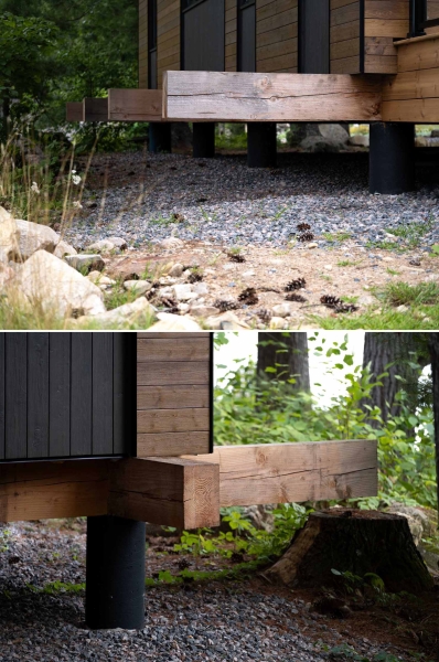 Exposed Wood Posts & Beams Add A Warm Rustic Touch To This Small Cabin