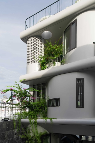 Plants Cascade Down The Exterior Of This New Home