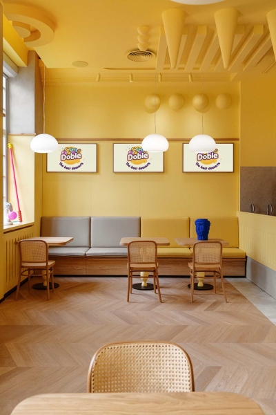 A Yellow Interior Sets The Tone For This Cafe