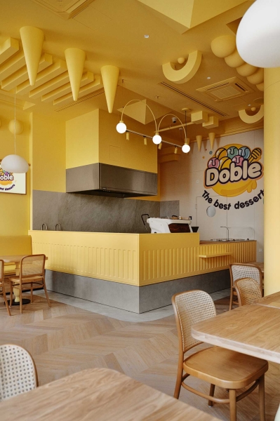 A Yellow Interior Sets The Tone For This Cafe