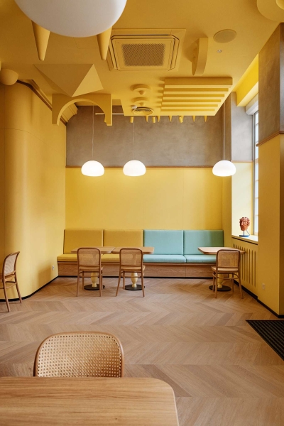 A Yellow Interior Sets The Tone For This Cafe