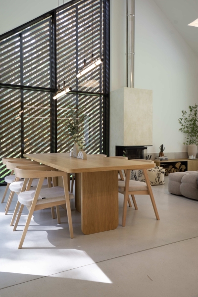 A Large Operational Screen Invites The Forest Views Into This Modern Home