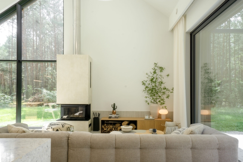 A Large Operational Screen Invites The Forest Views Into This Modern Home