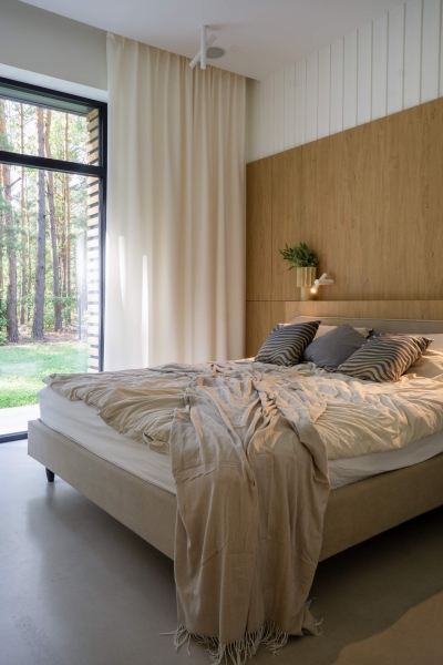 A Large Operational Screen Invites The Forest Views Into This Modern Home