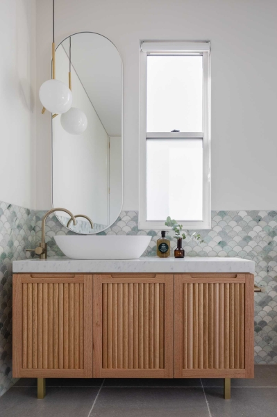 Vertical Panelled Cabinets Add Visual Interest To This Home's Interior