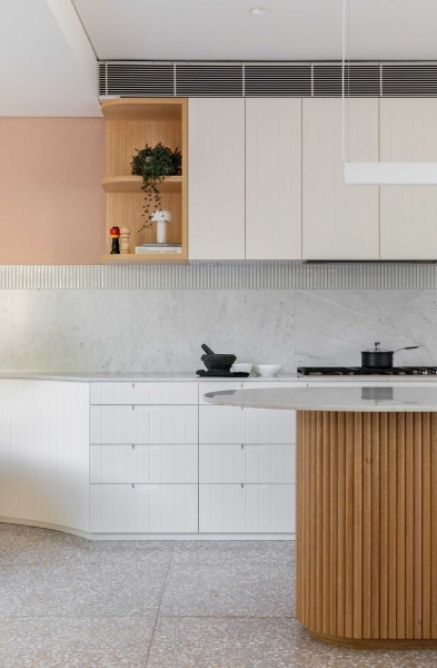 Vertical Panelled Cabinets Add Visual Interest To This Home's Interior