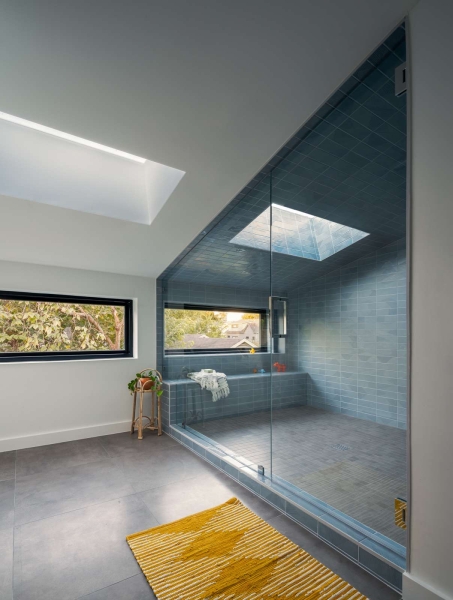 A Sky-Lit Blue-Tiled Shower Steals The Show Inside This Home