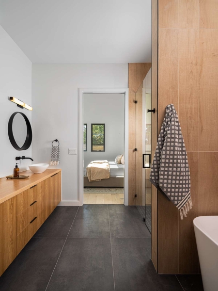A Sky-Lit Blue-Tiled Shower Steals The Show Inside This Home