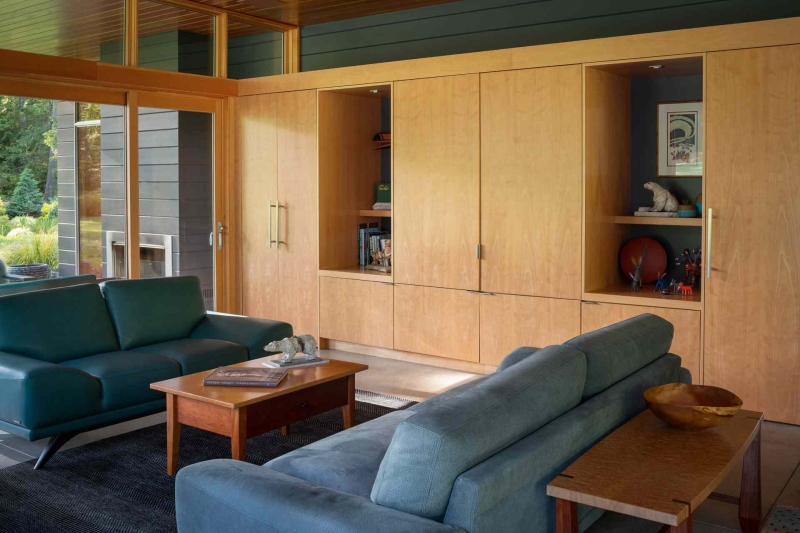 Modern meets nature in this home that opens to a meadow in the trees