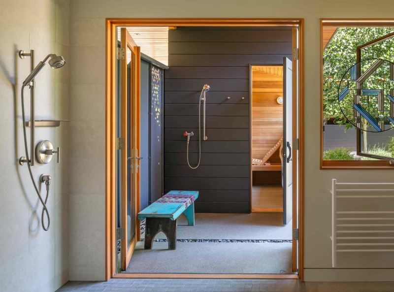 Modern meets nature in this home that opens to a meadow in the trees