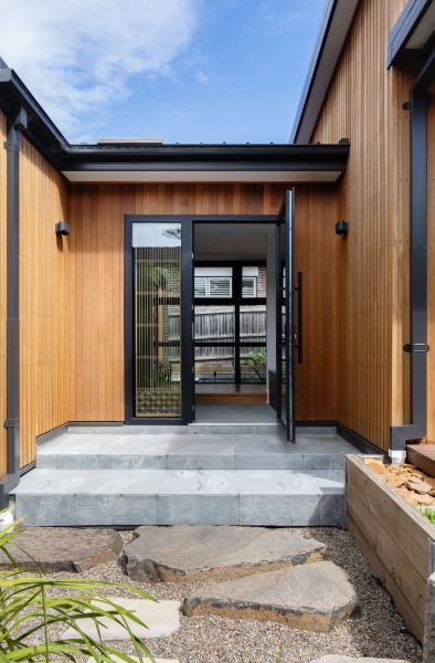 Step inside this Japanese-inspired home extension that's wrapped around a reflection pool