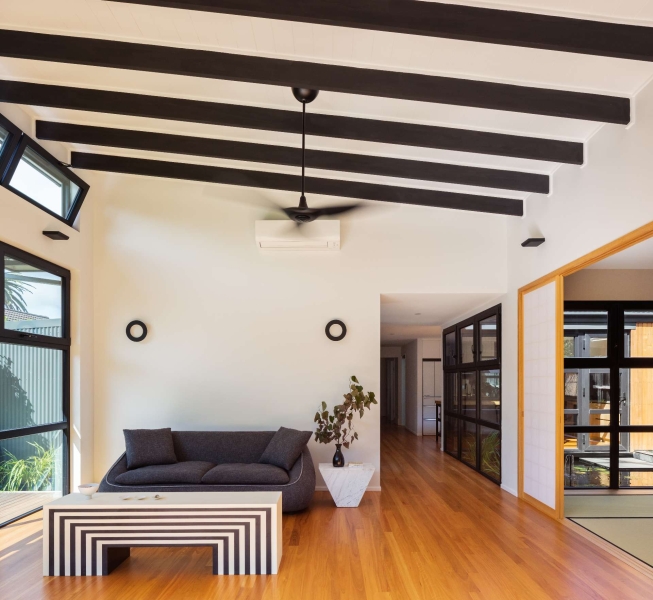Step inside this Japanese-inspired home extension that's wrapped around a reflection pool