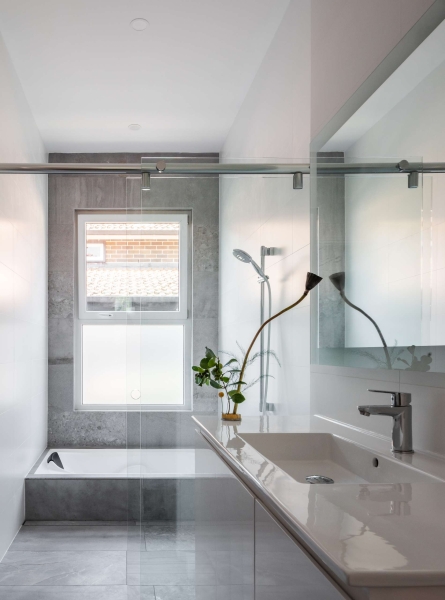 Step inside this Japanese-inspired home extension that's wrapped around a reflection pool