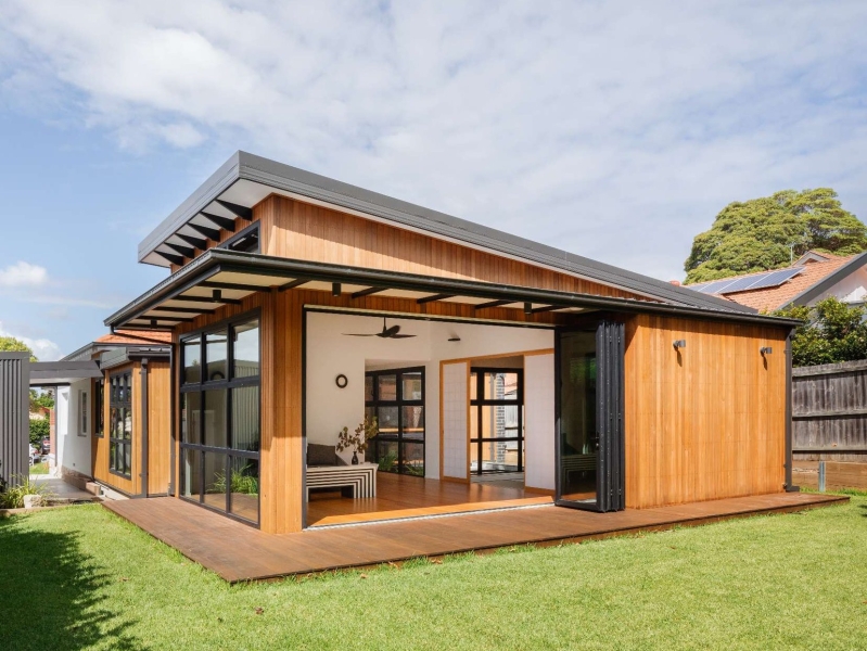 Step inside this Japanese-inspired home extension that's wrapped around a reflection pool