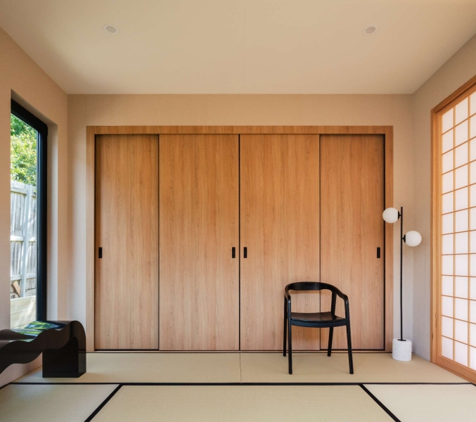 Step inside this Japanese-inspired home extension that's wrapped around a reflection pool