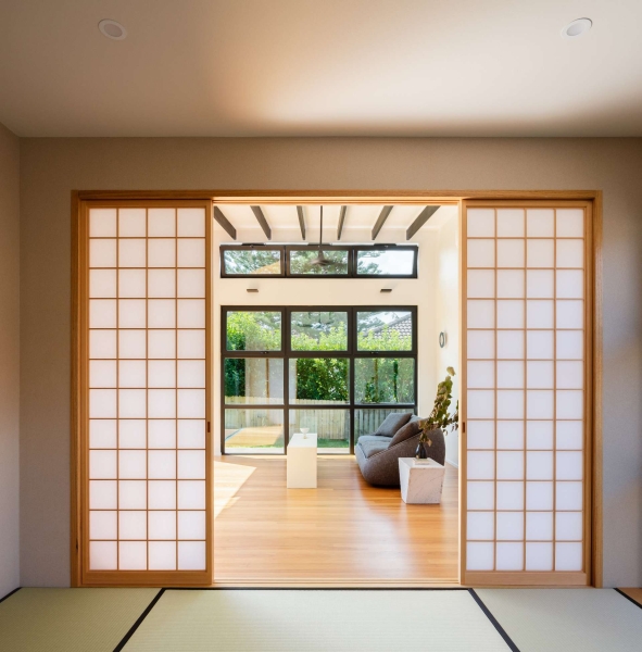 Step inside this Japanese-inspired home extension that's wrapped around a reflection pool