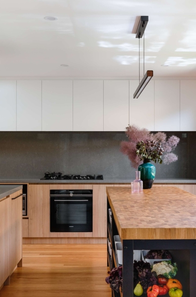 Step inside this Japanese-inspired home extension that's wrapped around a reflection pool