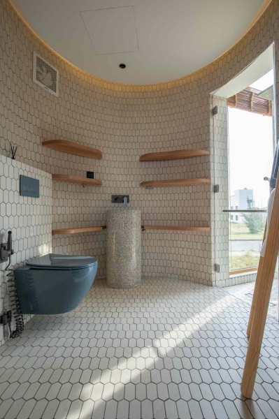 This house collects rainwater, grows trees indoors, and runs on solar power