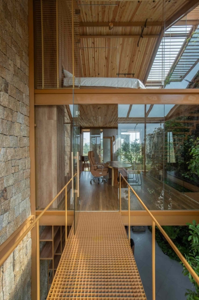 This house collects rainwater, grows trees indoors, and runs on solar power