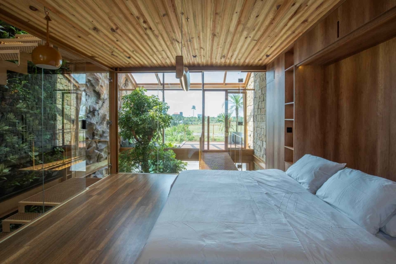 This house collects rainwater, grows trees indoors, and runs on solar power