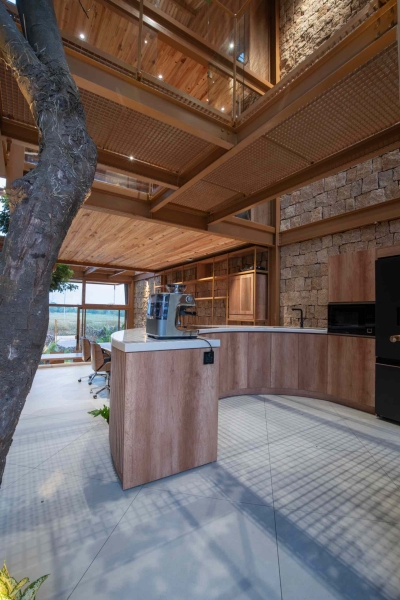 This house collects rainwater, grows trees indoors, and runs on solar power