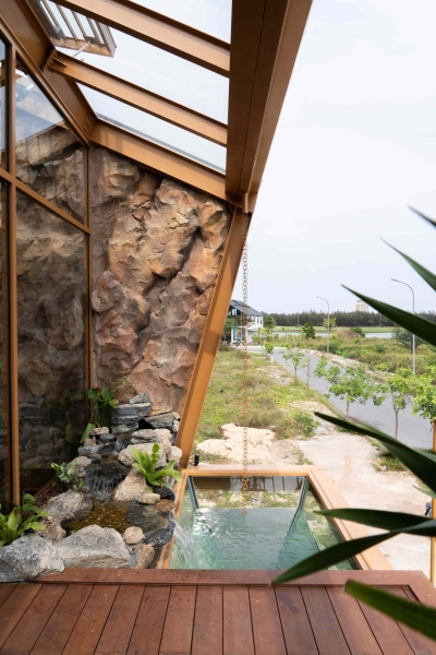 This house collects rainwater, grows trees indoors, and runs on solar power