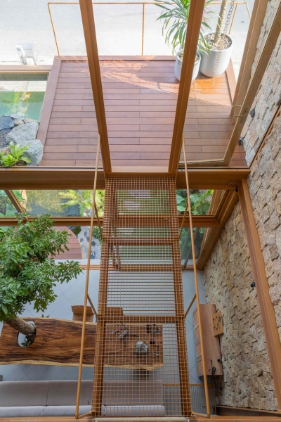 This house collects rainwater, grows trees indoors, and runs on solar power