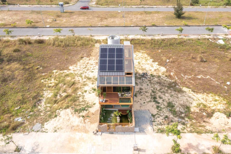 This house collects rainwater, grows trees indoors, and runs on solar power