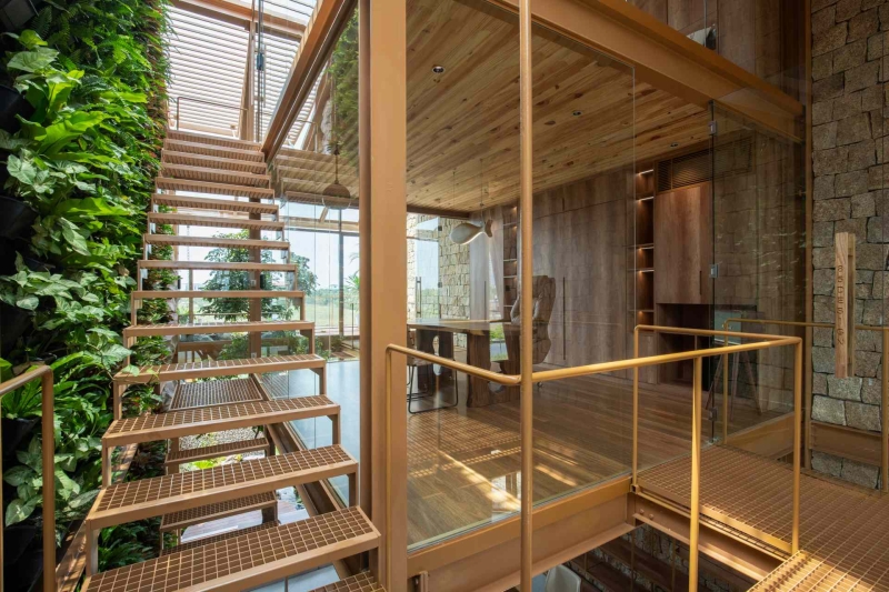This house collects rainwater, grows trees indoors, and runs on solar power