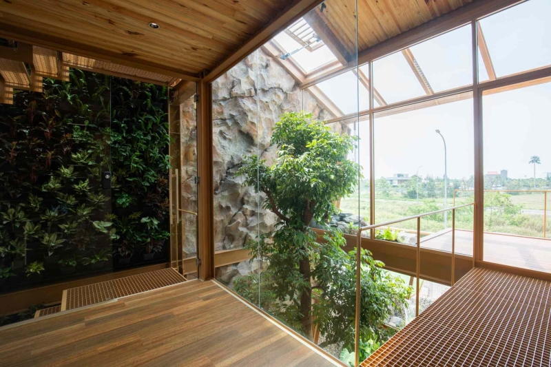 This house collects rainwater, grows trees indoors, and runs on solar power