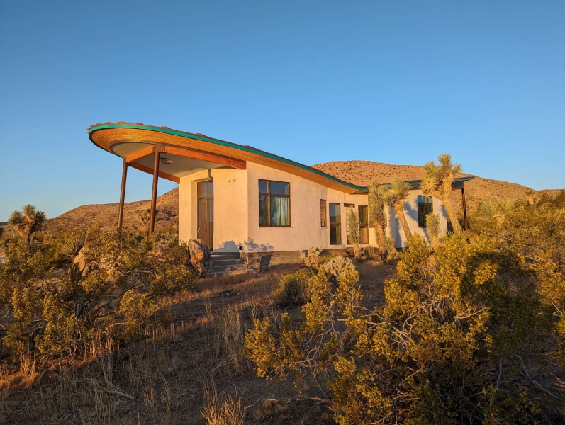 Would you live in a strawbale cabin? This off-grid desert home might change your mind