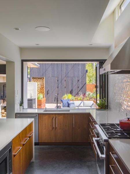 A Clever Pass-Through Window Turns This Kitchen Into a Social Hub