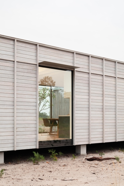 A Prefab Home With A Courtyard Designed to Embrace the Landscape