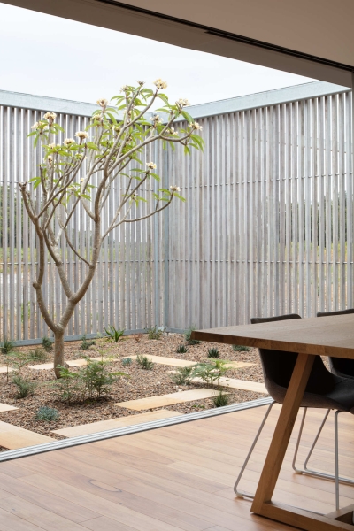A Prefab Home With A Courtyard Designed to Embrace the Landscape