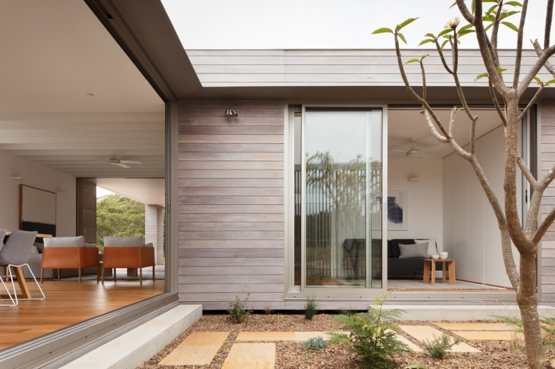 A Prefab Home With A Courtyard Designed to Embrace the Landscape