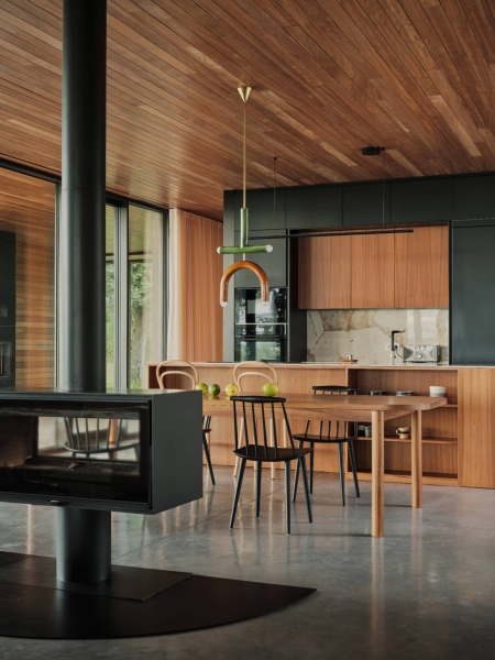 A Seaside Home Where Limestone, Wood, and Glass Unite