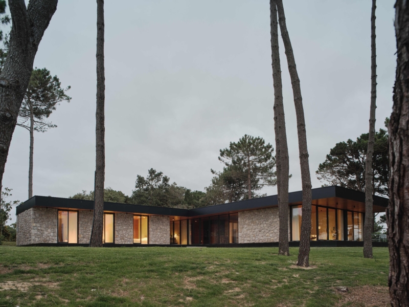 A Seaside Home Where Limestone, Wood, and Glass Unite