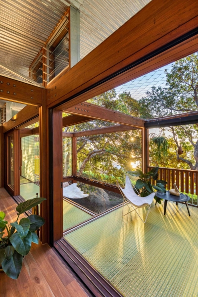 Above the Ground, Among the Leaves: A Modest Prefab Timber Home in the Trees