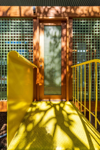 Above the Ground, Among the Leaves: A Modest Prefab Timber Home in the Trees