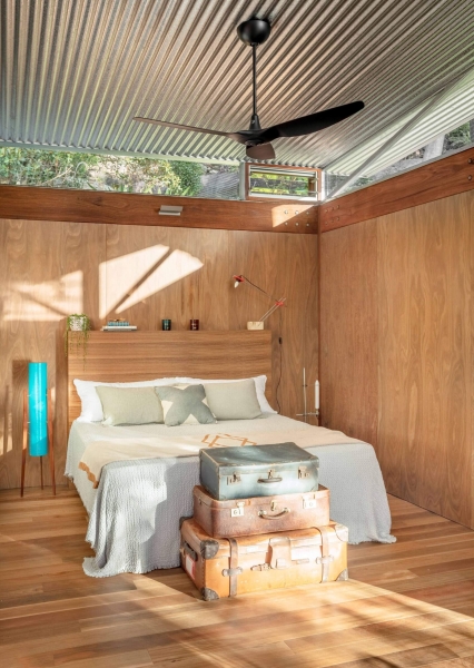 Above the Ground, Among the Leaves: A Modest Prefab Timber Home in the Trees