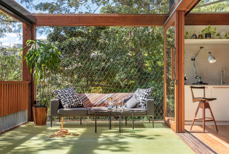 Above the Ground, Among the Leaves: A Modest Prefab Timber Home in the Trees