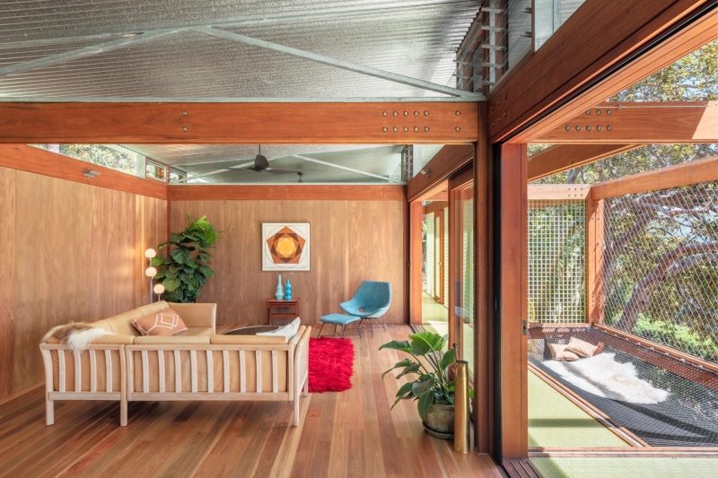 Above the Ground, Among the Leaves: A Modest Prefab Timber Home in the Trees