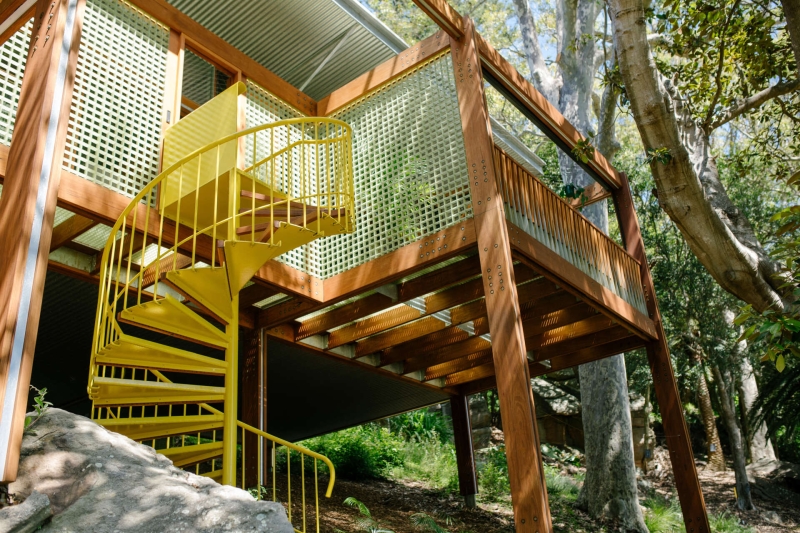 Above the Ground, Among the Leaves: A Modest Prefab Timber Home in the Trees