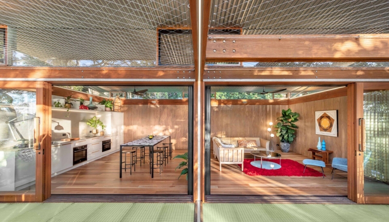 Above the Ground, Among the Leaves: A Modest Prefab Timber Home in the Trees