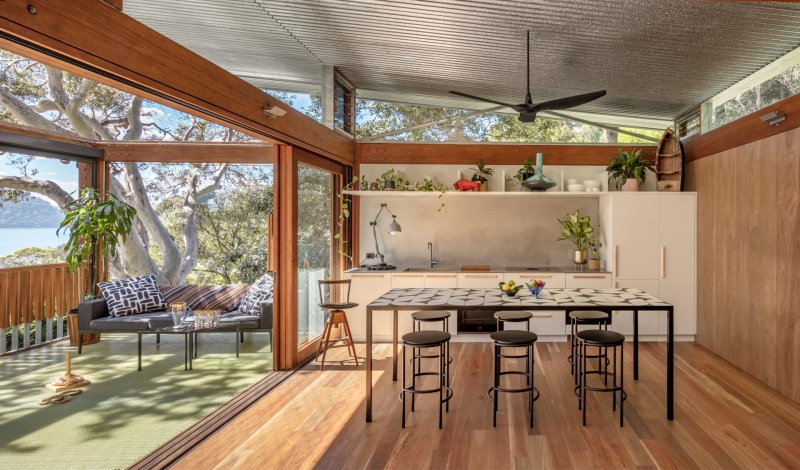 Above the Ground, Among the Leaves: A Modest Prefab Timber Home in the Trees