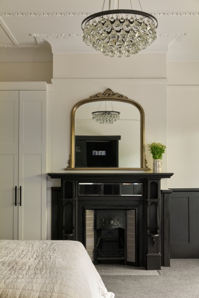 An Art Deco-Inspired Renovation with a Dual-Ended Kitchen Island