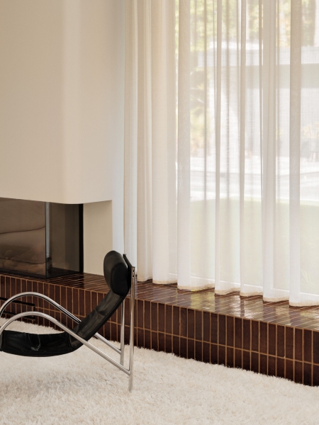 At First It Looks Simple, Then You Notice the Curved Fireplace and Built-In Lounge