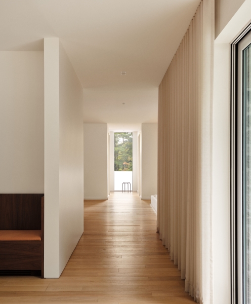 At First It Looks Simple, Then You Notice the Curved Fireplace and Built-In Lounge