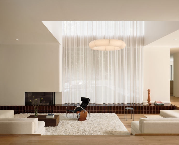 At First It Looks Simple, Then You Notice the Curved Fireplace and Built-In Lounge